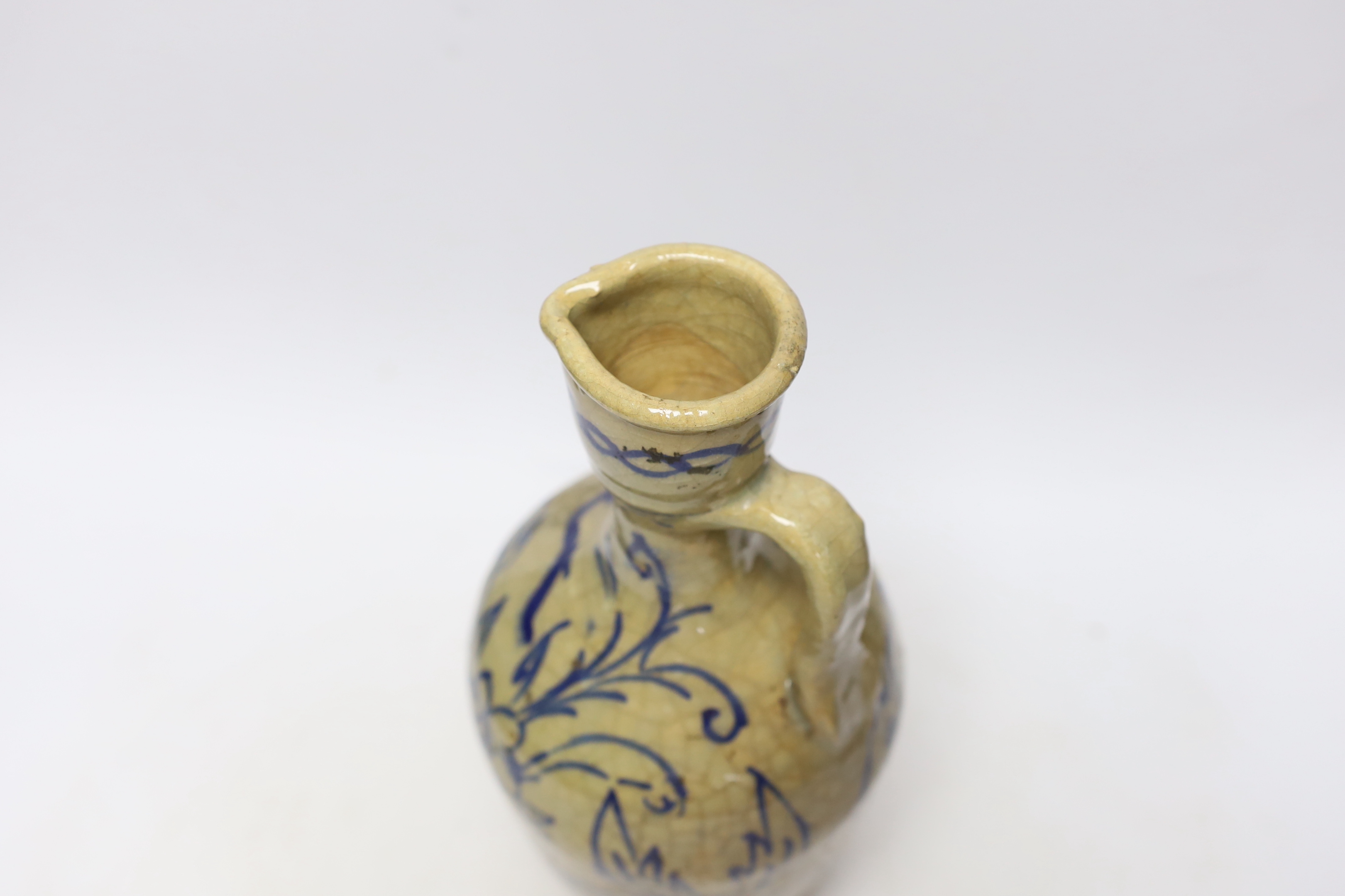 A Qajar dynasty fritware ewer, 31cm